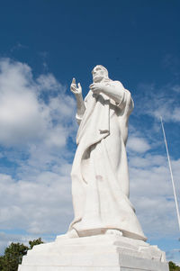 Low angle view of statue against sky