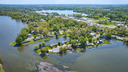 High angle view of townscape by lake