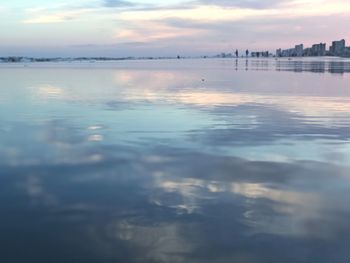 Scenic view of sea against sky at sunset