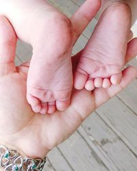 Close-up of hand holding hands