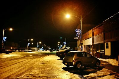 Illuminated street light at night