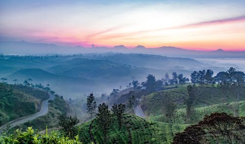 Scenic view of mountains against sky during sunset