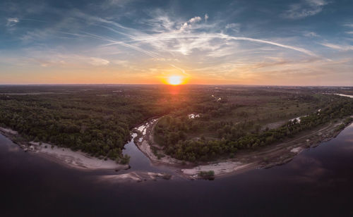 Scenic view of landscape against sky during sunset