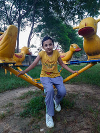 Portrait of smiling boy playing soccer