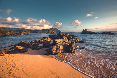 Scenic view of sea against sky during sunset