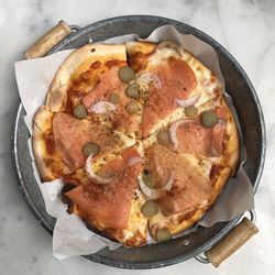 High angle view of pizza in plate on table