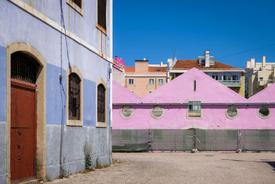 Exterior of buildings against blue sky