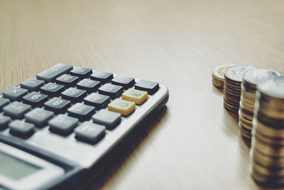 High angle view of coins on table