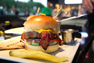 Close-up of burger in plate on table