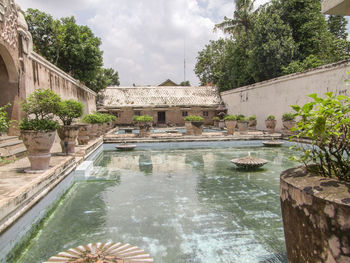 View of swimming pool in front of building