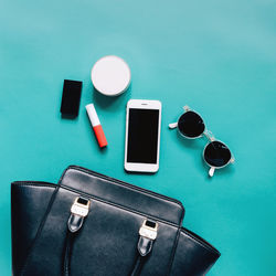 High angle view of smart phone on table