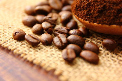Close-up of coffee beans on table