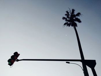 Low angle view of silhouette tree against clear sky