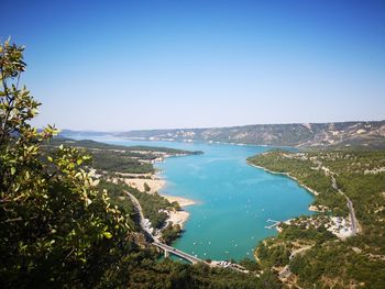 Scenic view of sea against clear blue sky