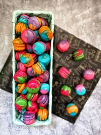 High angle view of multi colored candies on table