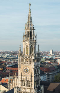 View of buildings in city against sky