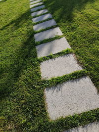 High angle view of paving stone on footpath