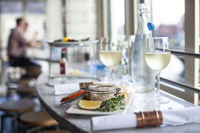 Seafood lunch on table in restaurant with white wine