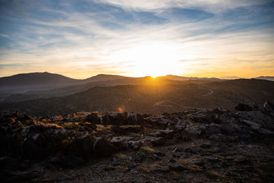 Scenic view of landscape against sky during sunset