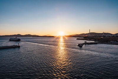 Scenic view of sea against sky during sunset