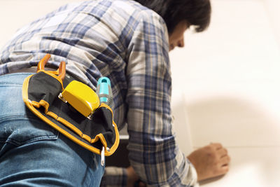 Low angle view of woman working at home