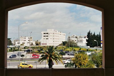 Buildings in city against sky