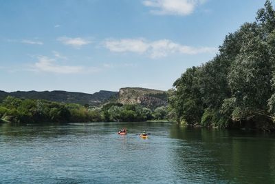 Scenic view of river against sky