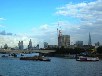 View of buildings in city against sky