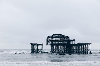 West pier on sea against clear sky at brighton