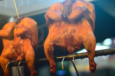 Close-up of meat on barbecue grill