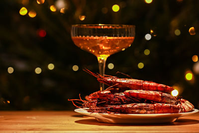 Close-up of wineglass on table