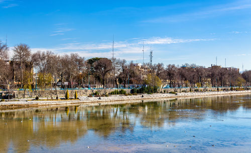 Scenic view of lake against blue sky