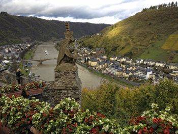 Scenic view of sea and mountains against sky