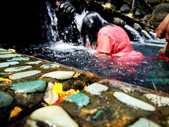 Close-up of water flowing through rocks