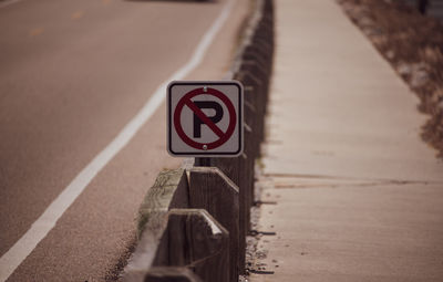 Close-up of road sign on street