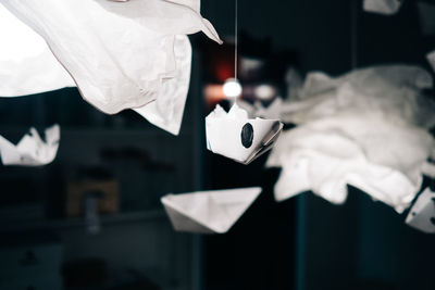 Close-up of origami hanging at home