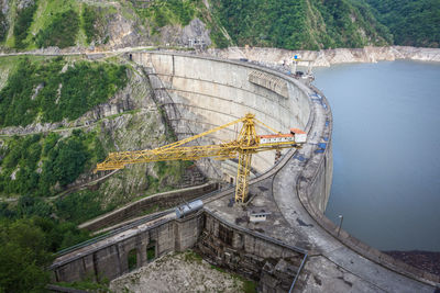 High angle view of dam amidst trees