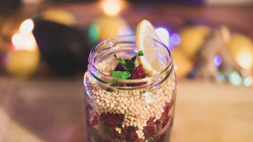 Close-up of drink in glass jar on table