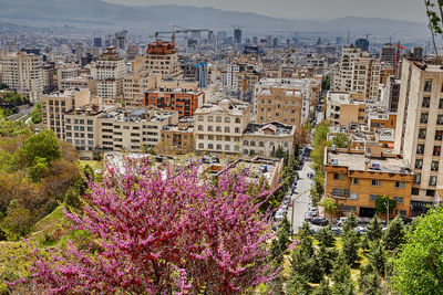 High angle view of buildings in city against sky