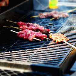 Close-up of meat on barbecue grill