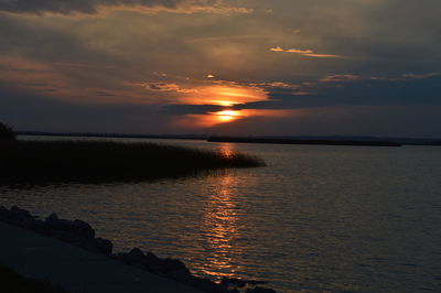 View of calm sea at sunset