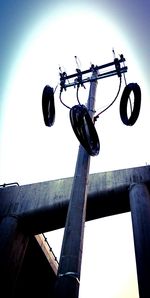 Low angle view of street light against sky