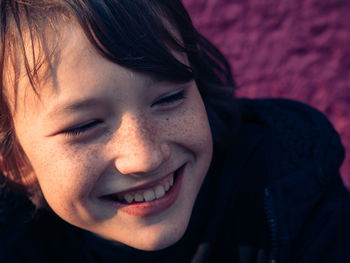 Close-up of boy smiling