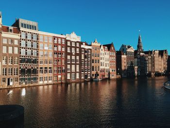 Buildings in distance with waterfront