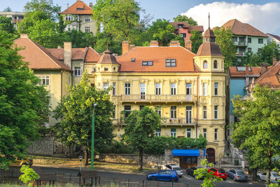 Residential buildings by street in city