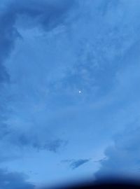 Low angle view of moon in sky