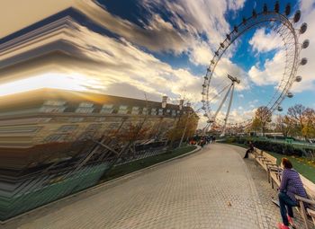Panoramic view of people at sunset