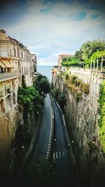 Buildings in city against sky
