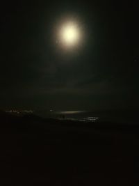 Scenic view of sea against sky at night