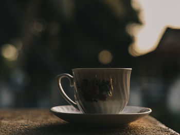 Close-up of coffee cup on table